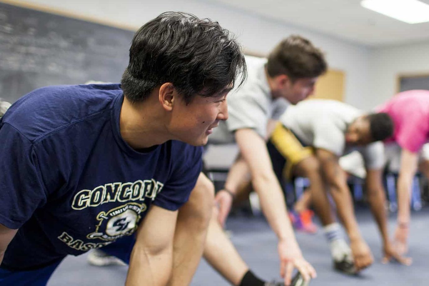 Image of Concordia University St. Paul Kinesiology students stretching.
