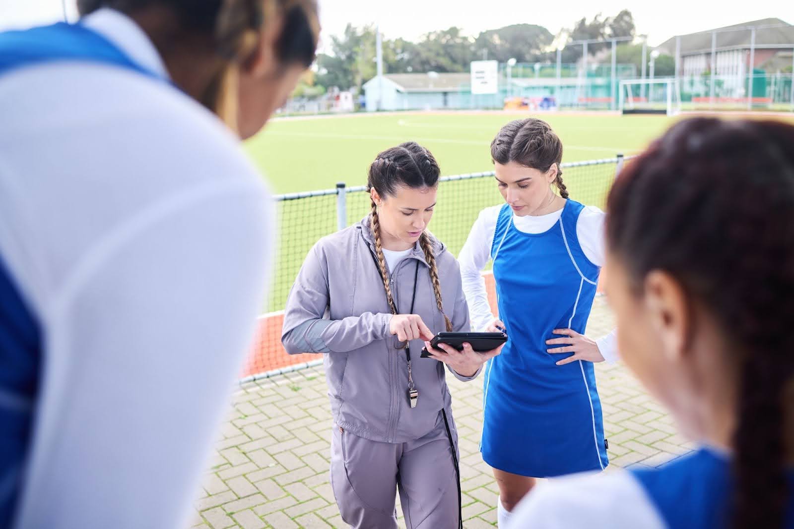 women coach training the athletes